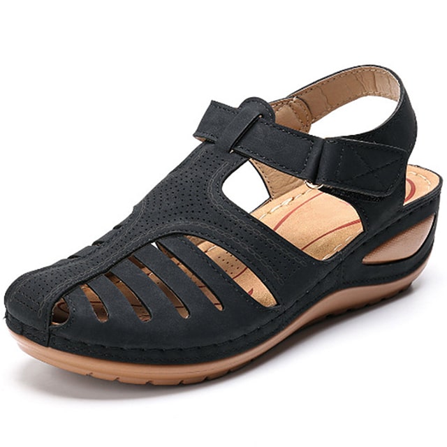 Women's orthopedic sandals with ergonomic design, arch support & adjustable strap for everyday comfort & foot pain relief.
