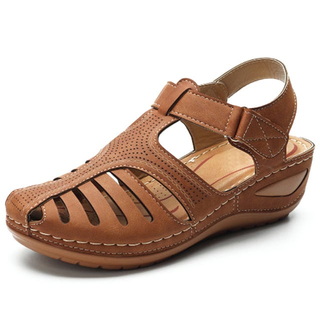 Comfortable women's orthopedic sandals with arch support, ergonomic design, and adjustable straps for foot pain relief.