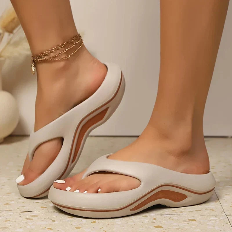Women's arch support slide sandals, providing orthopedic comfort for all-day walking and foot relief.