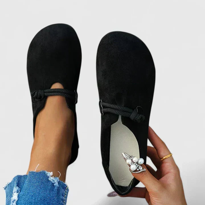 Ergonomic women's slip-on loafers, providing cushioned comfort & arch support for everyday wear.