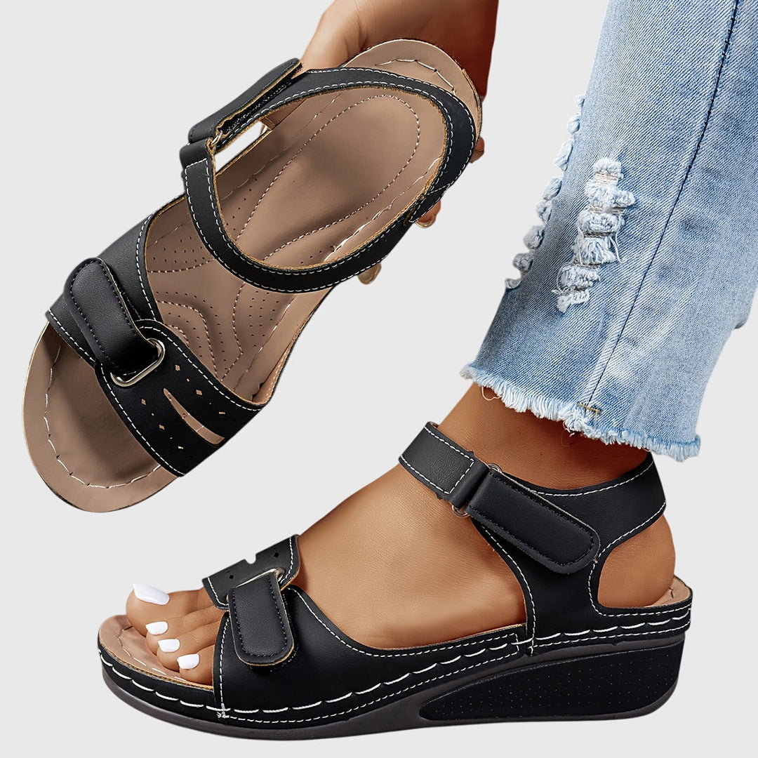 Casual women's orthopedic slip-on sandals, ideal summer footwear for comfort & arch support.
