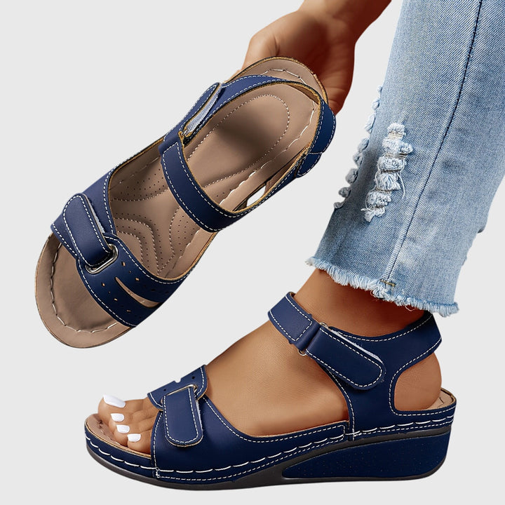 Walk comfortably in women's orthopedic slip-on sandals, providing arch support and foot pain relief.
