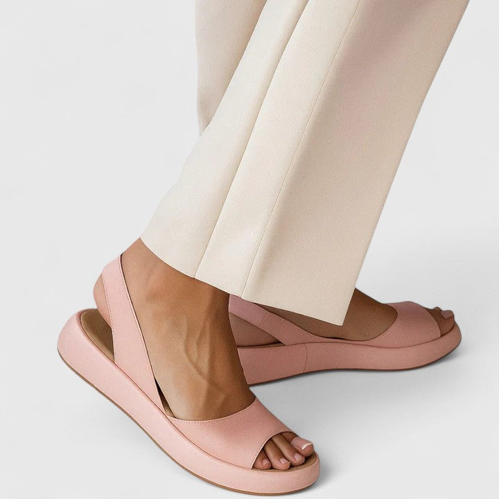 Women's orthopedic slip-on sandals with arch support for ultimate comfort.