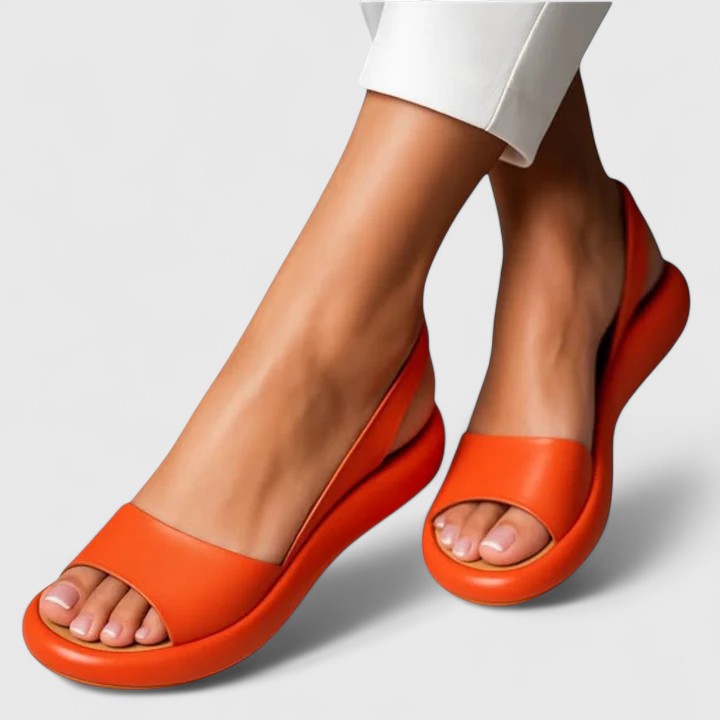 Comfortable women's slip-on walking sandals with cushioned arch support.