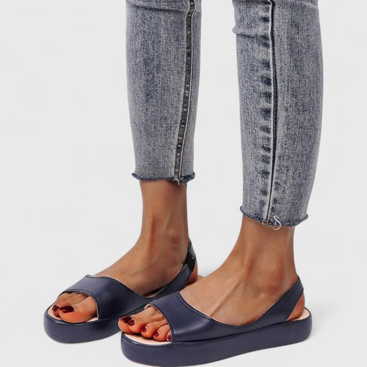 Women's comfortable orthopedic slip-on sandals with cushioned arch support.