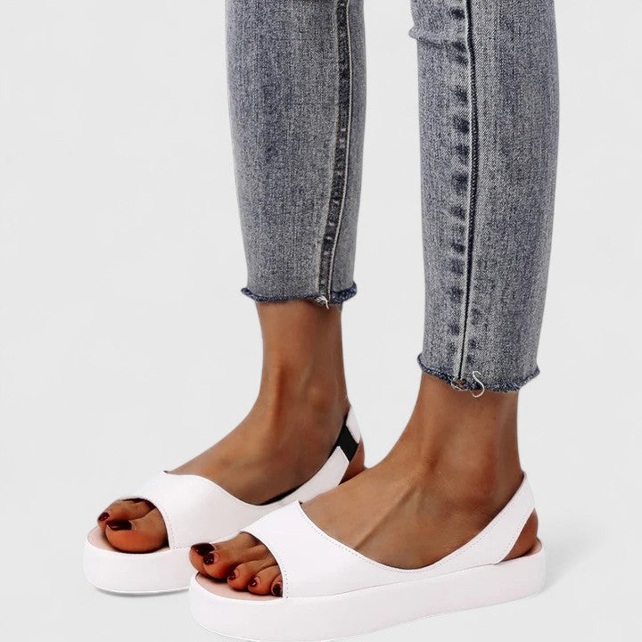 Orthopedic slip-on sandals for women, featuring excellent arch support & foot comfort.