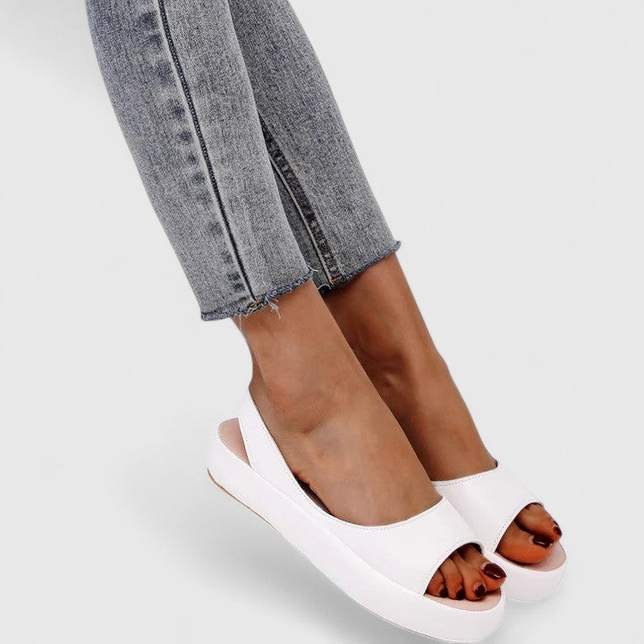 Cushioned slip-on orthopedic sandals for women, providing great arch support & foot comfort.