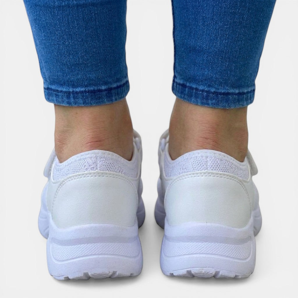 Women's supportive slip-on orthopedic sneakers with advanced cushioning for comfortable walking and daily wear.
