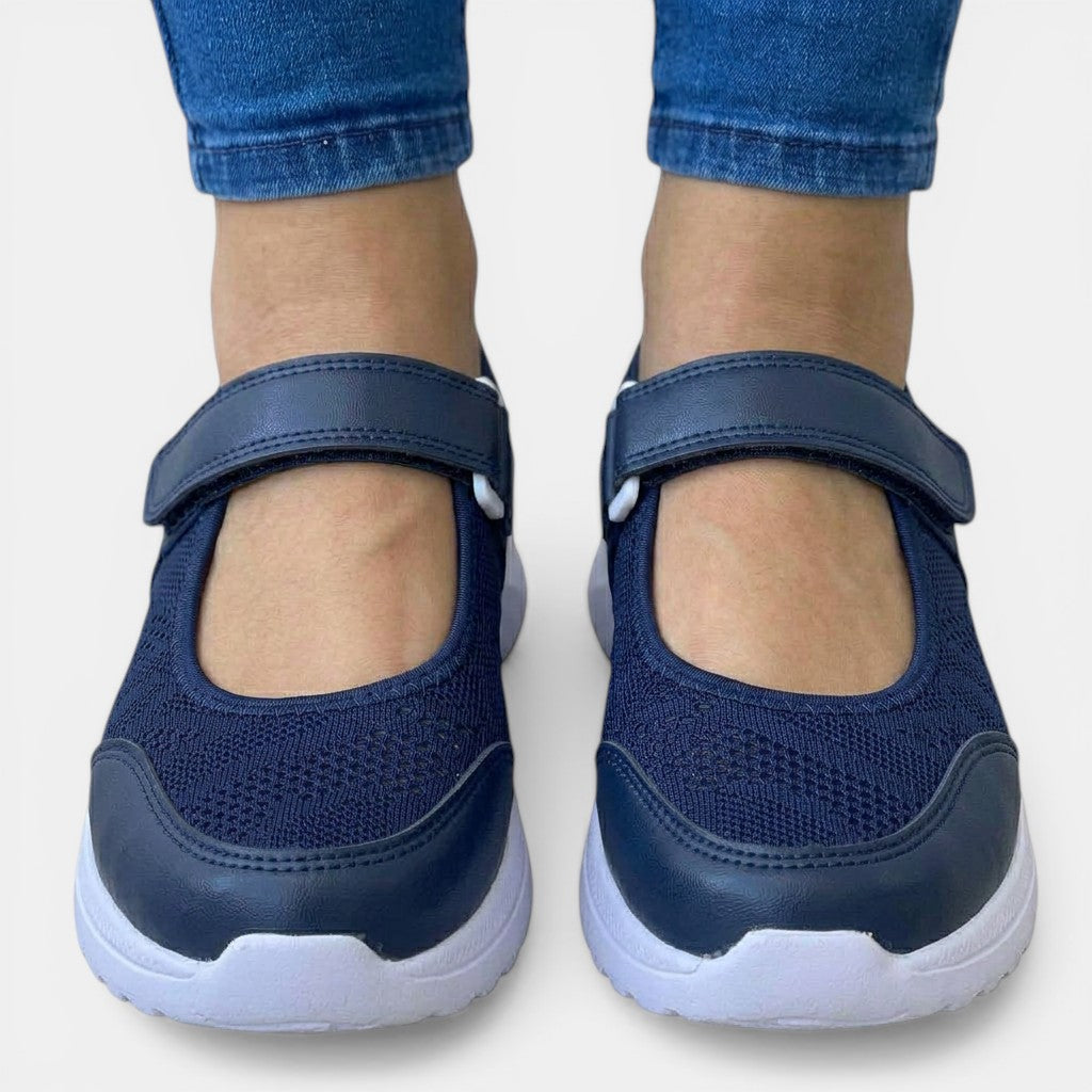 Modern women's slip-on comfort sneakers, engineered with orthopedic features for superior foot support.