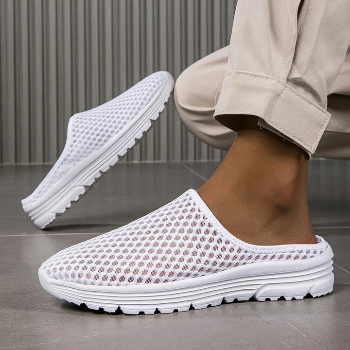 Women's orthopedic slip-on sneakers with cushioned arch support, perfect for comfortable everyday walking.