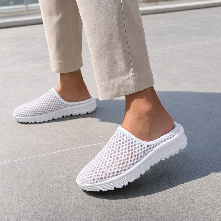 Breathable women's slip-on sneakers, providing excellent arch support and cushioning for active foot comfort.