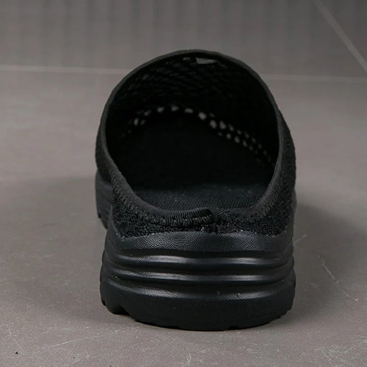Orthopedic women's slip-on shoes, designed for breathability and cushioned arch support for ultimate comfort.
