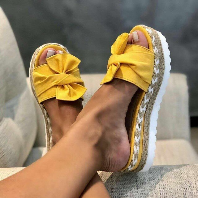Durable women's orthopedic sandals with breathable straps, cushioned platform, and advanced arch support for ultimate comfort.