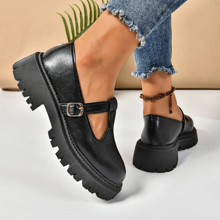 Black orthopedic platform T-strap Mary Jane shoes for women, featuring buckle closure & excellent arch support.