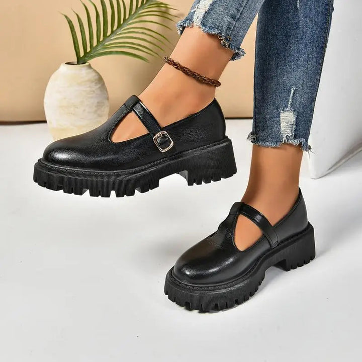 Stylish women's platform Mary Jane shoes with T-strap design, orthopedic comfort & secure buckle closure.
