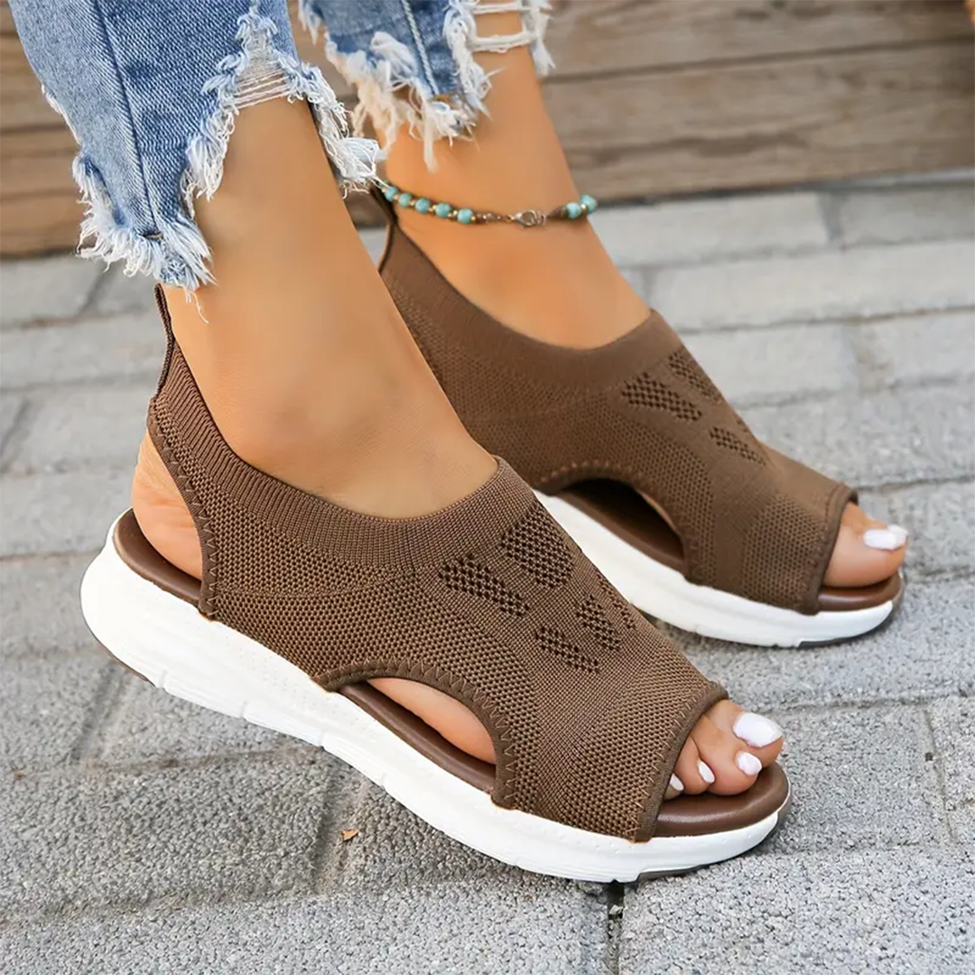 Adjustable women's orthopedic walking sandals, all-day comfort & non-slip grip.