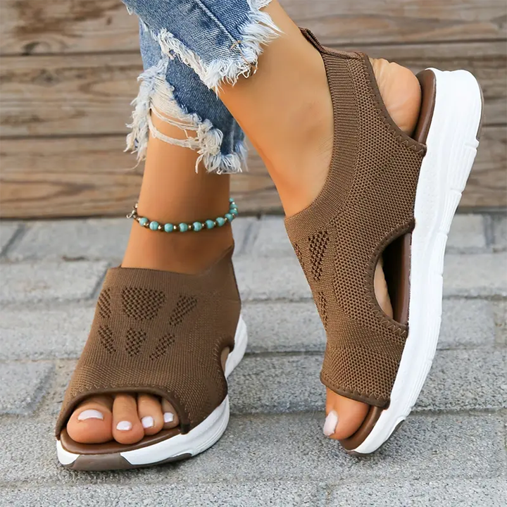Women's comfortable footwear, orthopedic walking sandals featuring arch support.