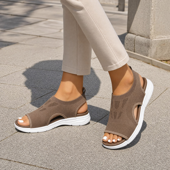 Comfortable women's walking sandals, orthopedic design with arch support for active outdoor use.