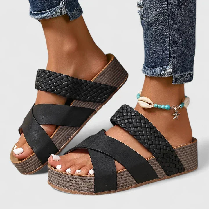 Orthopedic platform sandals for women. Woven crossover strap and open-toe design for casual summer wear.