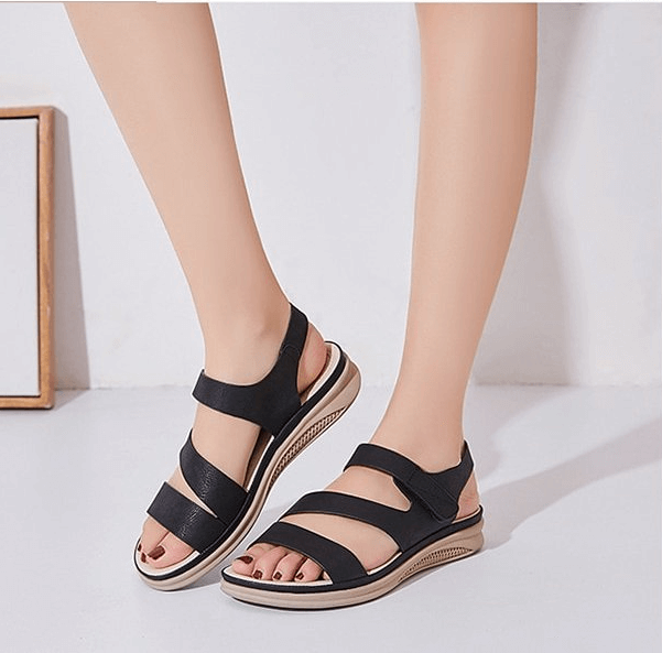 Fashionable women's wedge sandals with orthopedic support, perfect for comfortable summer walking.