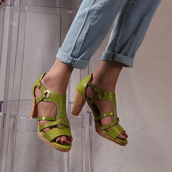 Chic women's wedge sandals, designed with orthopedic arch support for comfort.