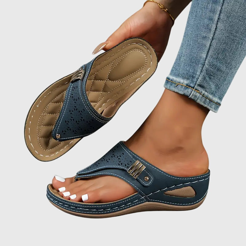 Comfortable women's slip-on wedge sandals with ergonomic arch support for foot pain relief & shock absorption.