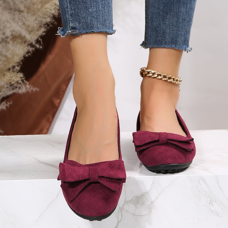 Slip-on women's ballet flats, orthopedic & wide fit for all-day supportive comfort.