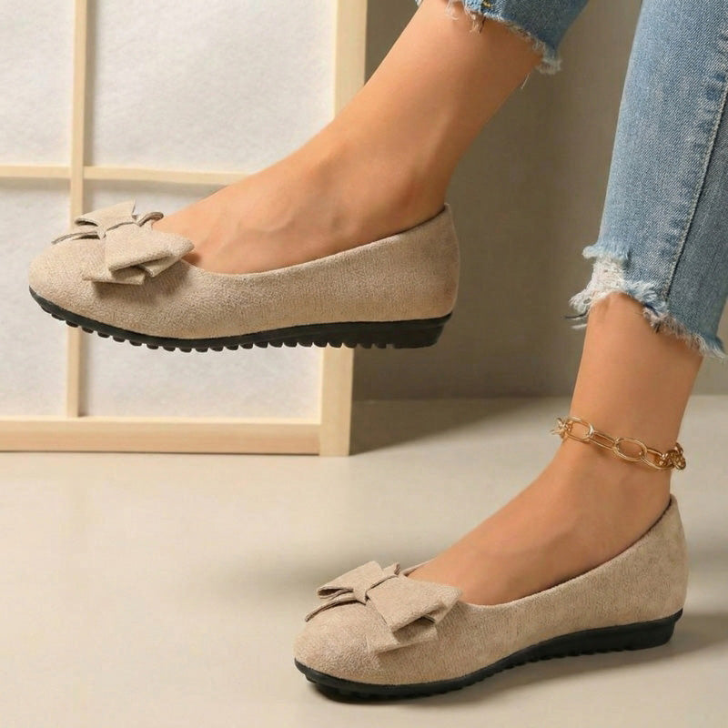 Elegant & comfortable women's wide fit orthopedic ballet flats, slip-on style.