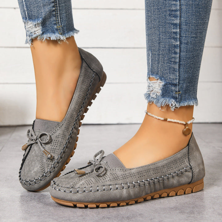 Orthopedic women's flat loafers, engineered for maximum cushioning and a wide slip-on fit.