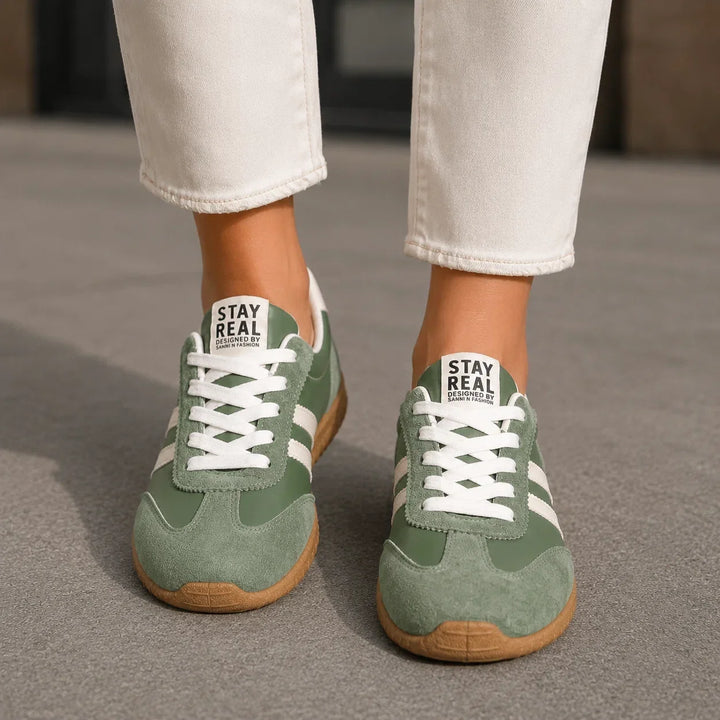 Close-up of cushioned sole on women's wide fit orthopedic trainers. Provides ultimate comfort & arch support for walking.