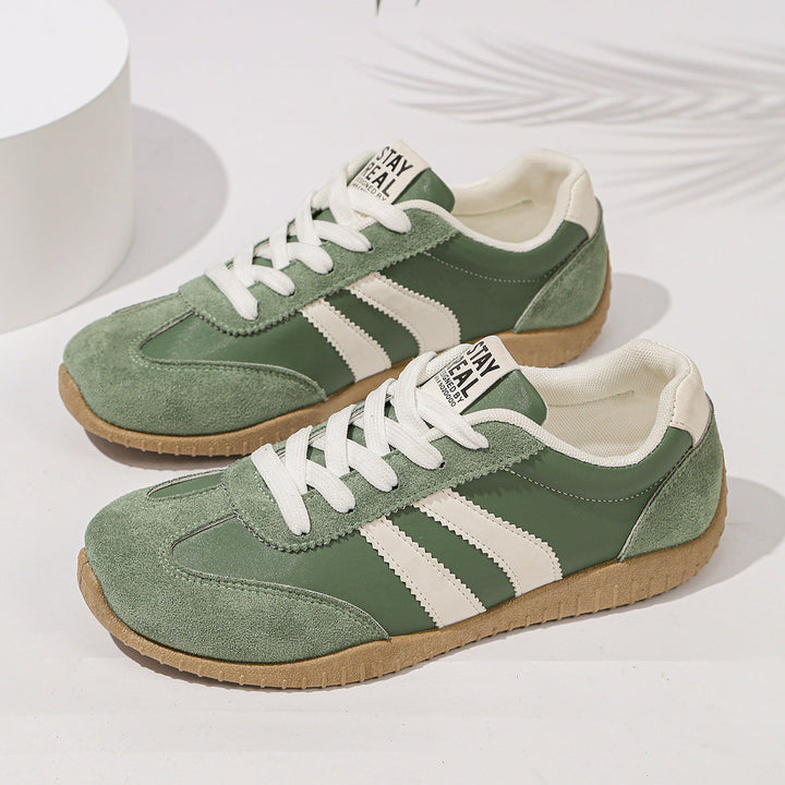 Stylish green women's orthopedic trainers with arch support & wide fit. Comfort shoes for active daily wear.