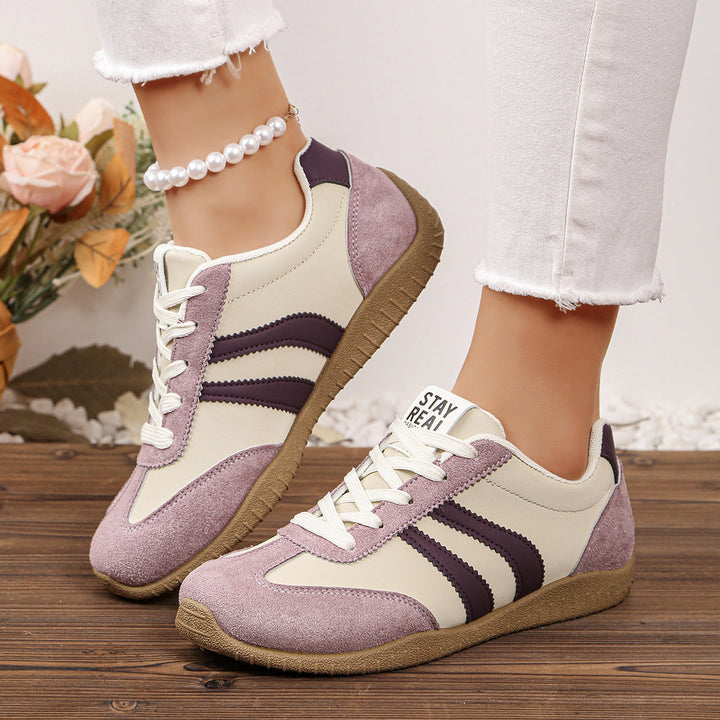 Pair of women's wide fit orthopedic trainers with arch support. Excellent supportive footwear for walking & daily comfort.