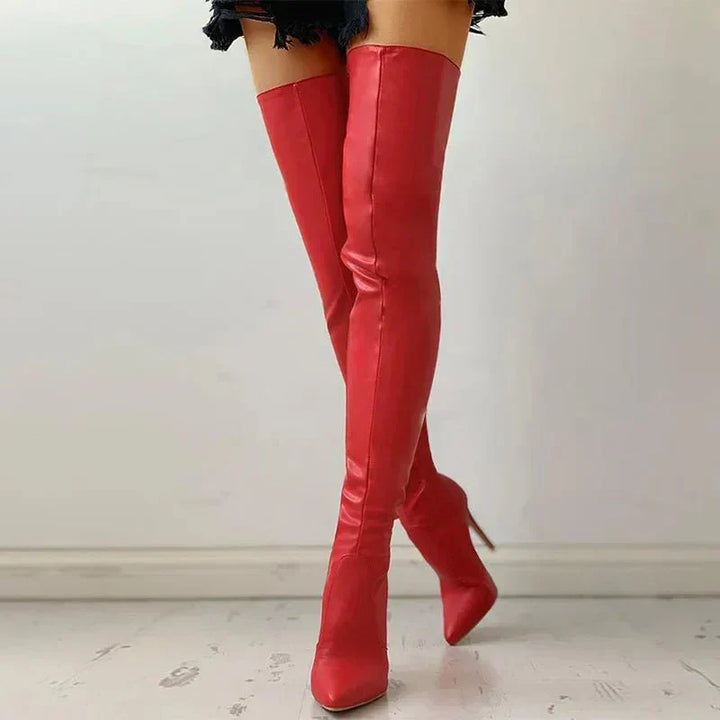 Stylish women's slim-fit over the knee boots, featuring a sleek pointed toe & slender stiletto heel. Ideal for parties.