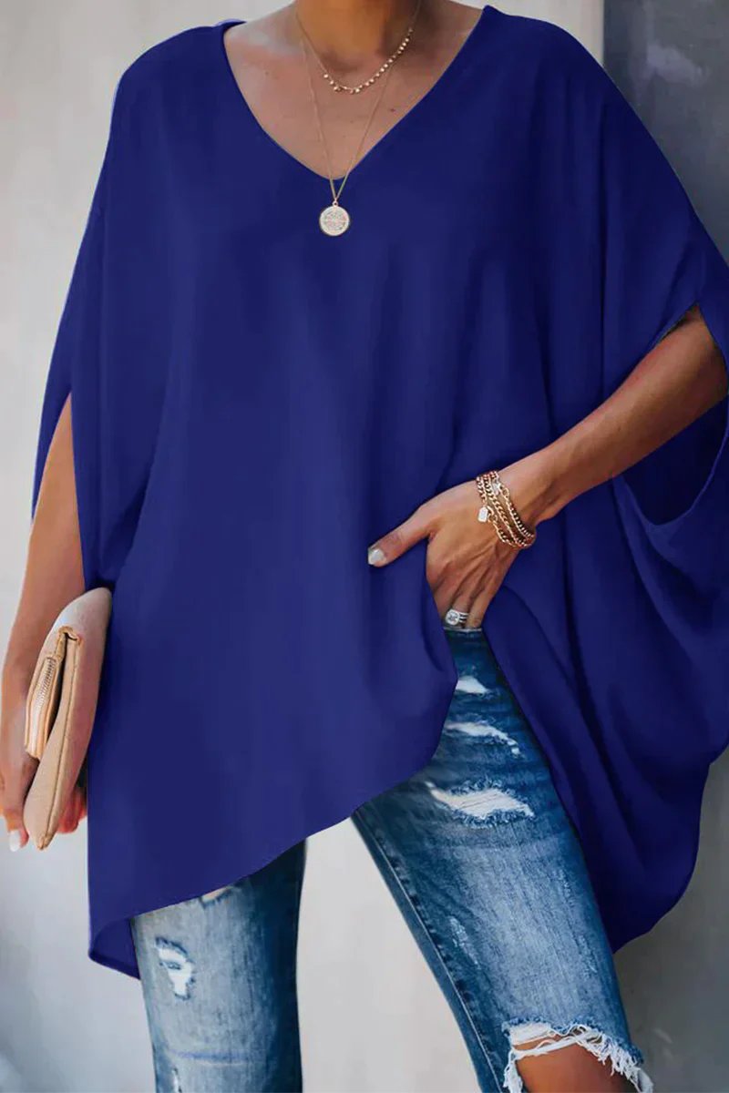 Plus size friendly women's oversized V-neck shirt, offering a relaxed fit for everyday comfort.