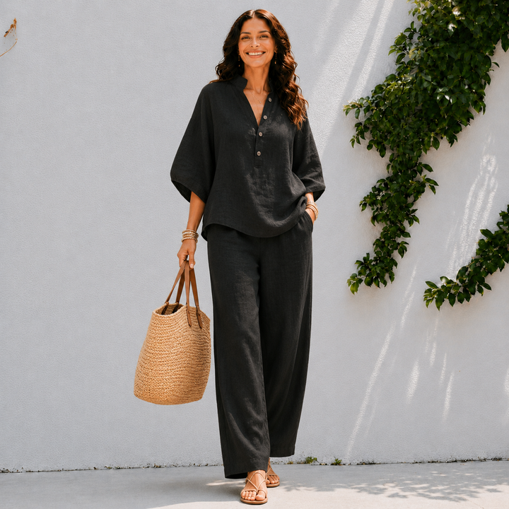 Chic women's oversized blouse & wide pants set, a comfortable and stylish two-piece for brunch or travel.