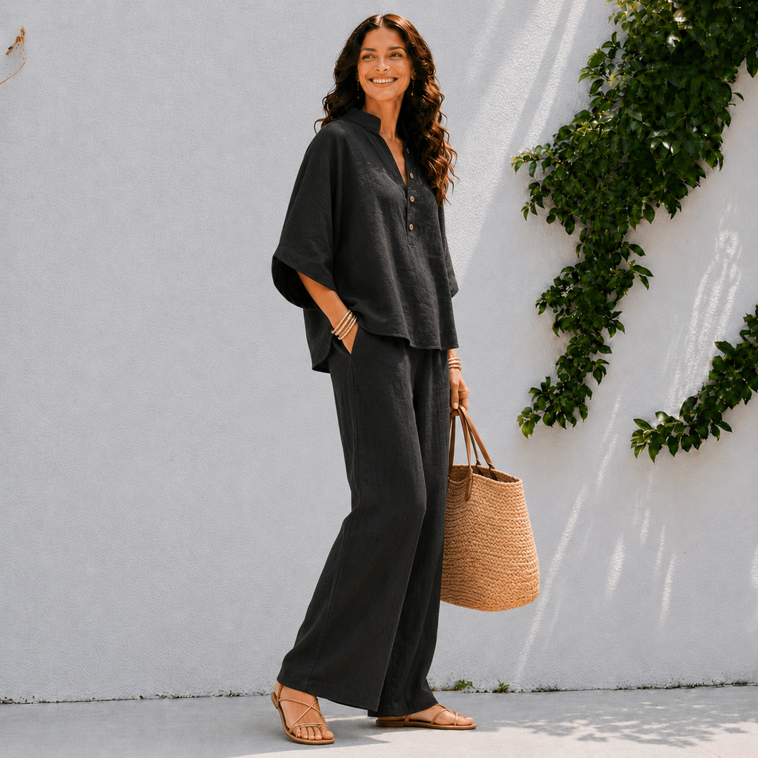 Flowy women's matching set with an oversized blouse & wide-leg pants, perfect for comfortable vacation wear.