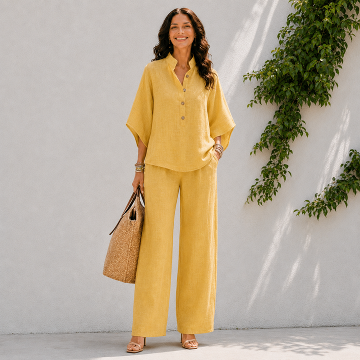 Women's travel matching set featuring a loose fit oversized blouse and wide-leg pants.