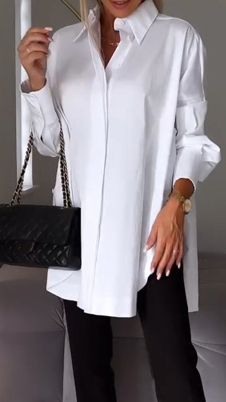 Stylish oversized blouse for women, featuring a classic collar. Ideal for workwear or relaxed fits.
