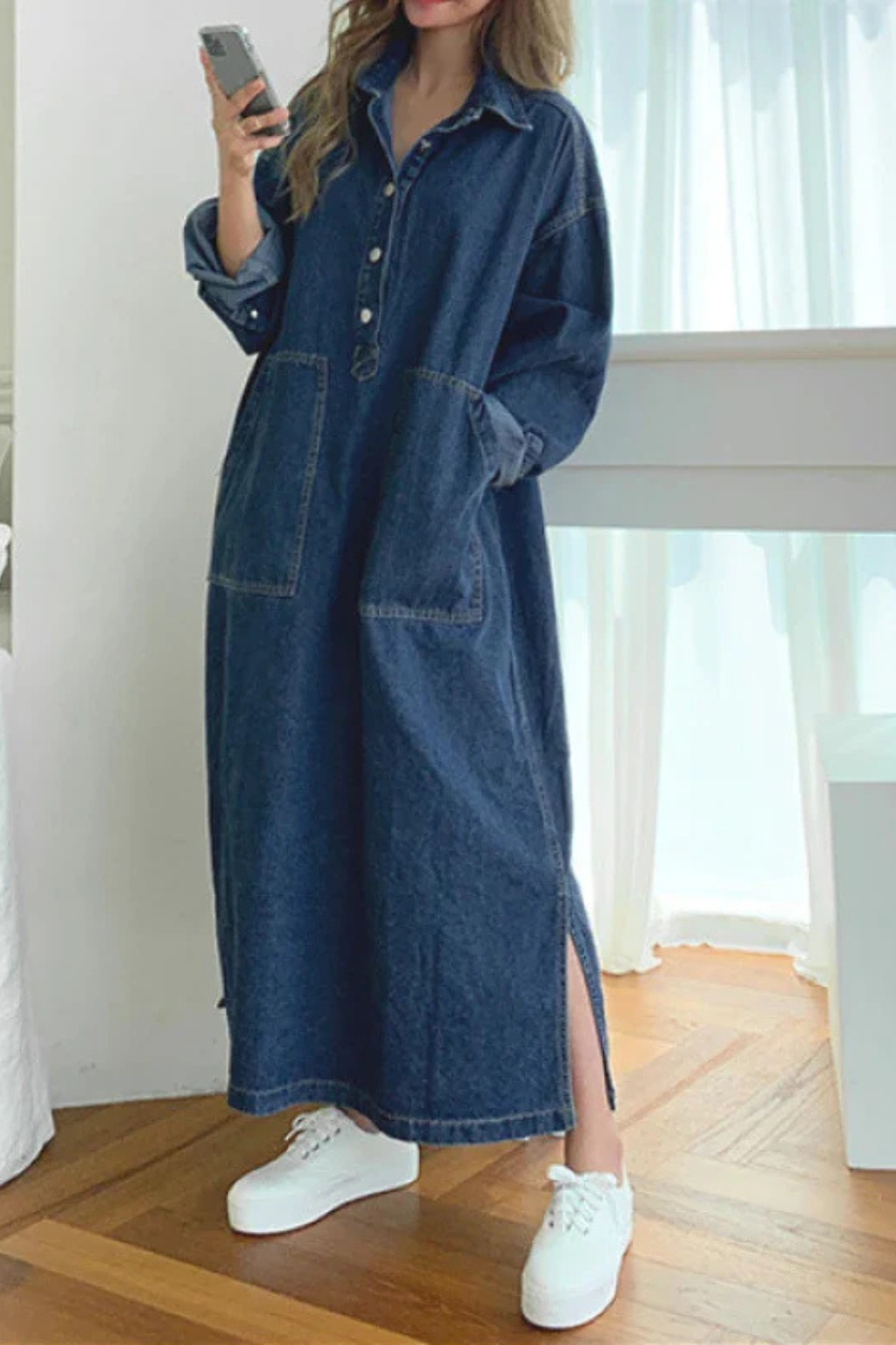 Blue denim oversized maxi shirt dress for women, featuring convenient pockets and a classic button front.