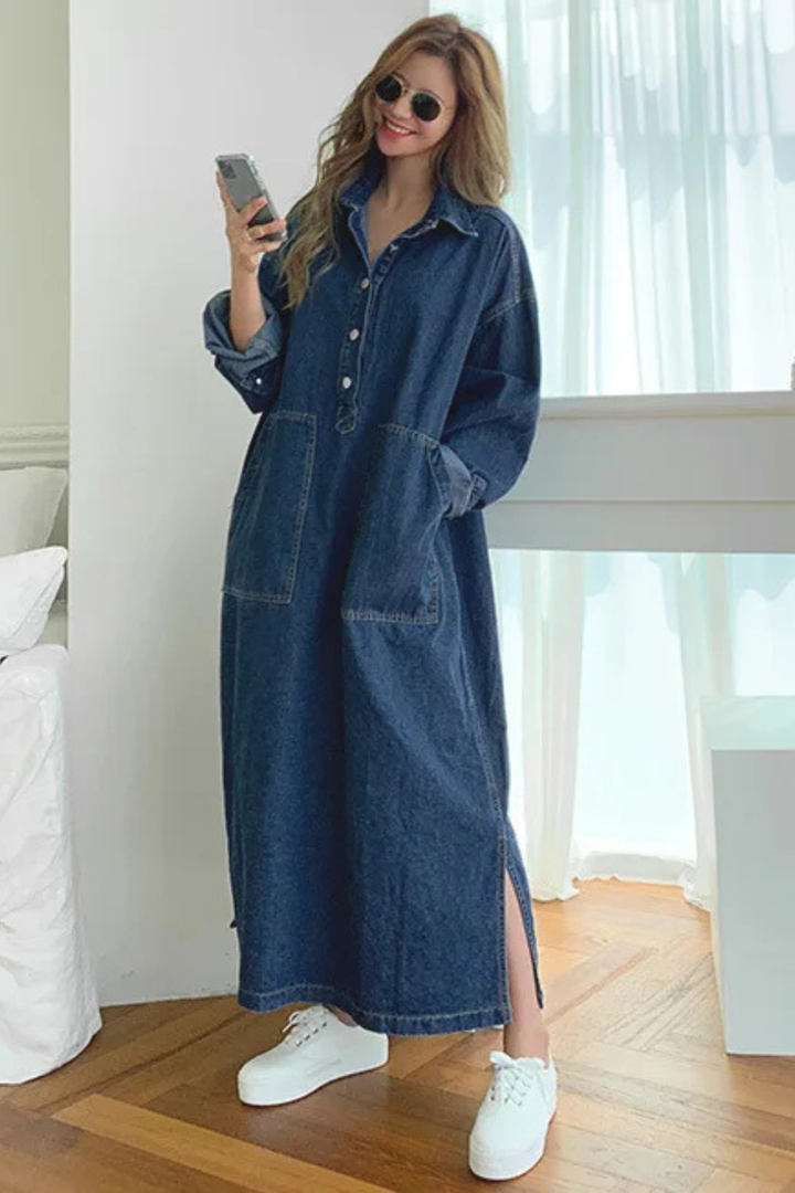 Comfortable women's oversized blue denim maxi shirt dress, offering a relaxed fit and stylish casual look.
