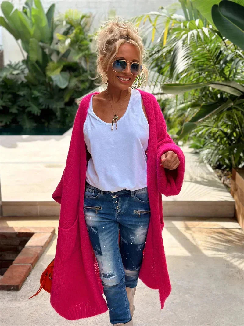 Boho chic women's longline knit cardigan with "Peace" slogan, open front, perfect for layering.
