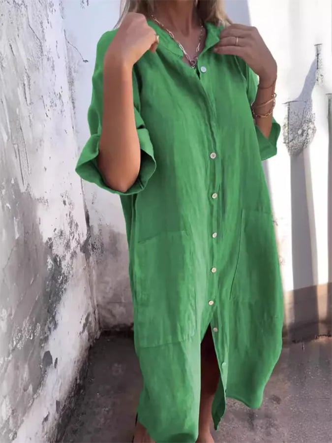 Stylish women's oversized button-down midi shirt dress with pockets for comfortable, easy-wear fashion.