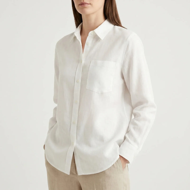 Comfortable oversized women's button-down shirt for effortless style and relaxed daily wear.