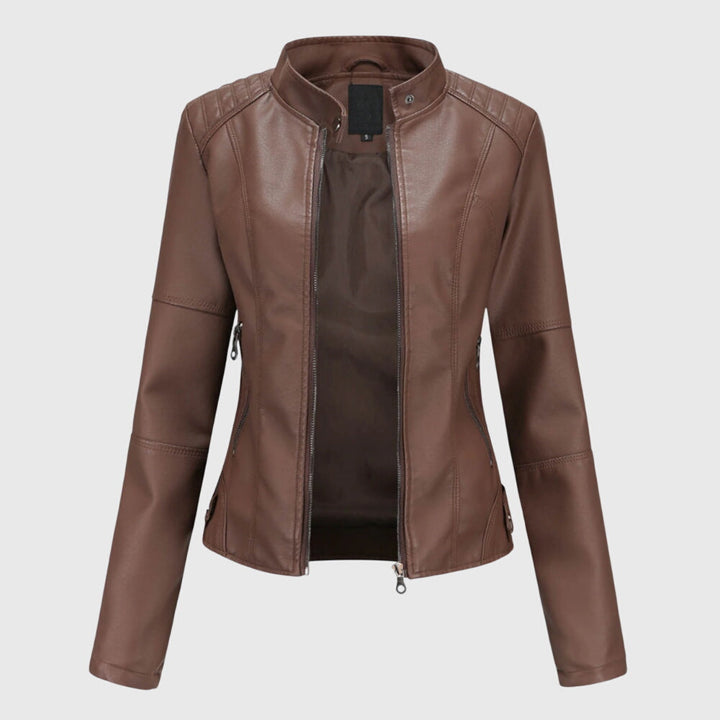 Relaxed fit women's shacket with button front and collar. Versatile outerwear for a comfortable, stylish look.