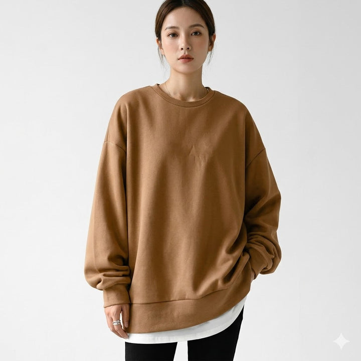 Women's oversized dropped shoulder sweatshirt in soft fabric, perfect for cozy casual wear & lounge fashion.