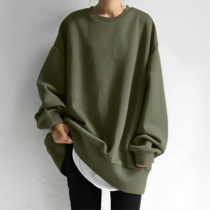 Relaxed fit women's long sleeve sweatshirt, ideal for comfortable everyday fashion and versatile layering.