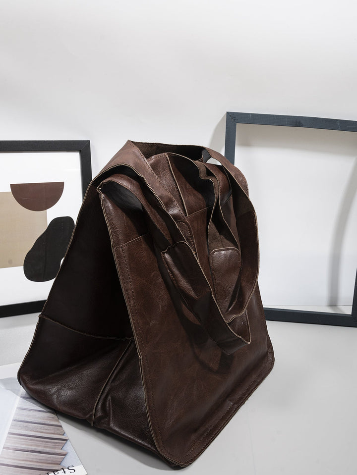 Elegant black oversized shoulder bag for women. A durable & fashionable everyday tote, ideal for travel.