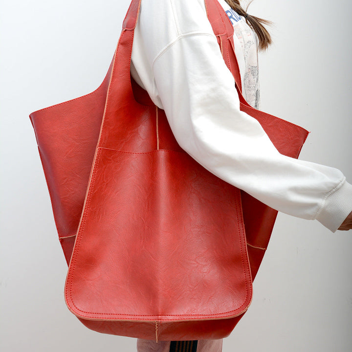 Vibrant red oversized shoulder bag for women. A stylish & large everyday tote, perfect for every occasion.