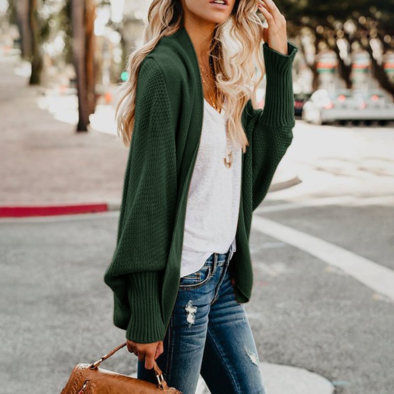 Women's oversized knit cardigan, cozy & chic style for versatile fall & winter layering.