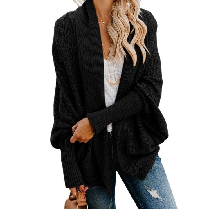 Elegant women's oversized cardigan, ideal for stylish layering & cozy warmth in cooler weather.